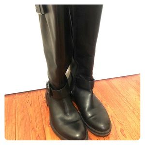 Tall leather boots in black